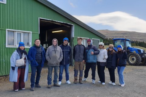 The AUCA guest with farmers at Kiðafell farm in Kjós