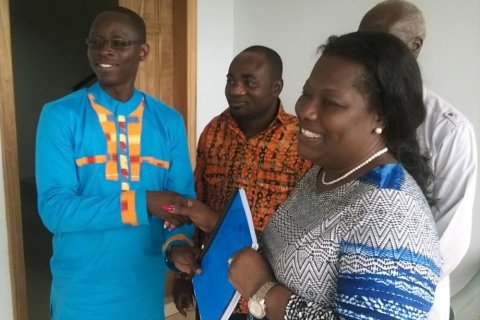 Daniel Amponsah and Nana Oye Lithur during the submission of Mr. Amponsah‘s final assignment titled ‘Sexuality in transition: Examining the changing sexual orientation and behavior among Ghanaians‘, alongside the District Chief Executive of Shama District Assembly.