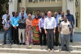 Participants and lecturers by the Palais du Peuple